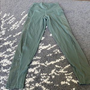 Green AERIE leggings with mesh sides and pockets